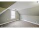 Cozy bedroom with a window, neutral walls, and plush carpeting for comfort at 410 Plum St, Frankton, IN 46044