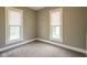 Neutral bedroom with carpet, window and traditional styling at 410 Plum St, Frankton, IN 46044