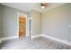 Spacious living room featuring modern flooring, neutral paint, and ample natural light at 410 Plum St, Frankton, IN 46044