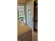 Bright laundry room featuring a door to the backyard, and convenient washer and dryer hookups at 420 Brookside Ln, Plainfield, IN 46168