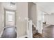 Inviting entryway with hardwood flooring and a staircase leading to the upper level at 425 Weaver Ln, Pittsboro, IN 46167