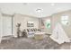 Cozy living room features a comfortable couch and playful teepee tent at 425 Weaver Ln, Pittsboro, IN 46167
