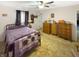 A spacious bedroom boasts ample natural light and multiple dressers for storage at 4329 Rutgers Dr # 40B, Anderson, IN 46013