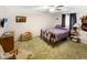 Cozy bedroom featuring vintage furniture and a ceiling fan for added comfort at 4329 Rutgers Dr # 40B, Anderson, IN 46013