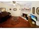 Inviting living room featuring a fireplace, piano, glass coffee table and TV with a beach view at 4329 Rutgers Dr # 40B, Anderson, IN 46013