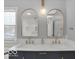 Elegant bathroom with marble counters, dual sinks, and modern fixtures at 44 Horseshoe Ln, Carmel, IN 46033