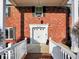 Welcoming front entrance with white railing leading to the front door at 44 Horseshoe Ln, Carmel, IN 46033