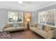 Cozy living room with neutral paint, lots of sunlight and wooden floors at 44 Horseshoe Ln, Carmel, IN 46033