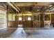 Outbuilding interior features open wooden frame and horse stalls at 453 N 275 E, Columbus, IN 47203