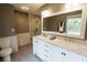 Bright bathroom featuring a vanity with marble countertop and glass enclosed shower at 46 Hawthorne Ct, Carmel, IN 46033