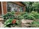 A lush garden with a variety of plants and flowers, adding natural beauty to the home's exterior at 46 Hawthorne Ct, Carmel, IN 46033