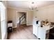 Bright living room featuring hardwood floors and a view of the staircase at 46 Hawthorne Ct, Carmel, IN 46033