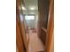 Cozy full bathroom with tile flooring and vintage fixtures at 4609 Andover Rd, Indianapolis, IN 46226