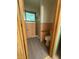 Tiled full bathroom featuring a standing shower with glass door and retro color scheme at 4609 Andover Rd, Indianapolis, IN 46226