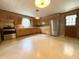 Traditional kitchen with wood cabinetry, stainless steel appliances, and neutral flooring at 472 N 17Th St, Noblesville, IN 46060