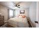 Bedroom with natural light, soft linens, ceiling fan and neutral decor at 4927 Caroline Ave, Indianapolis, IN 46205