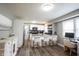 Kitchen with bar seating, stainless steel appliances and granite countertops at 4927 Caroline Ave, Indianapolis, IN 46205