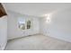 Bright bedroom with natural light, neutral carpeting, and ample wall space at 5269 Deer Creek Dr, Indianapolis, IN 46254