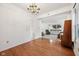 Hardwood floors in open-concept living and dining area at 5269 Deer Creek Dr, Indianapolis, IN 46254