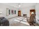 Bright living room with natural lighting, fireplace, and wooden furniture at 5269 Deer Creek Dr, Indianapolis, IN 46254