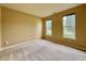 Neutral-toned bedroom featuring carpet, natural light from two windows, and fresh paint, ready for personalization at 5571 Auburndale Dr, Bargersville, IN 46106