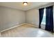Inviting bedroom with plush carpeting, soothing gray walls, and window adorned with blue curtains at 5571 Auburndale Dr, Bargersville, IN 46106