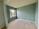 Cozy bedroom with carpet, neutral paint, and one window offering a pleasant view at 5571 Auburndale Dr, Bargersville, IN 46106