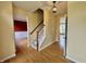 Inviting foyer with hardwood floors, staircase, and views into the adjacent living spaces at 5571 Auburndale Dr, Bargersville, IN 46106