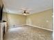 Open-concept living room with modern flooring and a fireplace at 5571 Auburndale Dr, Bargersville, IN 46106