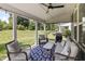 Inviting covered patio with cozy seating, a grill, and stylish decor, perfect for outdoor living at 5917 Bartley Dr, Noblesville, IN 46062