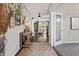 Stylish entryway with hardwood floors and decorative console table with decor at 5917 Bartley Dr, Noblesville, IN 46062