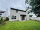 Spacious backyard featuring a well-maintained lawn, perfect for outdoor activities at 5938 Tybalt Ln, Indianapolis, IN 46254