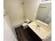 Compact bathroom featuring a combined shower-tub and a single sink vanity in a clean design at 5938 Tybalt Ln, Indianapolis, IN 46254