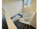 Open foyer with natural light features staircase, tile entry, and view to the front door at 5938 Tybalt Ln, Indianapolis, IN 46254