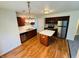 Bright kitchen featuring wooden cabinets, stainless steel appliances, and a central island at 5938 Tybalt Ln, Indianapolis, IN 46254