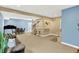 Expansive finished basement showcases a bar, dining area, sofa, and treadmill providing space to relax and entertain at 6050 Acorn Dr, Columbus, IN 47201