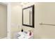 Well-lit bathroom with a vanity, mirror, and neutral decor, creating a clean and inviting space at 6050 Acorn Dr, Columbus, IN 47201