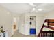 Neutral-toned bedroom boasts a closet, an adjacent bathroom, and a partial view of a bunk bed at 6050 Acorn Dr, Columbus, IN 47201