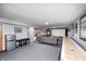 Spacious basement features a large entertainment space and bar area at 6143 Schoolwood Dr, Indianapolis, IN 46224