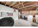 Basement storage area with open ceiling is ready for your personal touches at 6143 Schoolwood Dr, Indianapolis, IN 46224