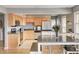 Well-lit kitchen with modern appliances and a functional layout, complemented by a charming dining area at 6143 Schoolwood Dr, Indianapolis, IN 46224