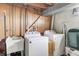 Unfinished laundry area with a utility sink and side-by-side washer and dryer hookups at 6143 Schoolwood Dr, Indianapolis, IN 46224
