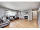 Bright living room with hardwood floors and stylish decor, offering a welcoming space at 6143 Schoolwood Dr, Indianapolis, IN 46224