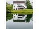 Back of house overlooking the lake at 6771 Woodcliff Cir, Zionsville, IN 46077