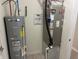 Mechanical room with water heater and furnace at 6926 Trey Dr, Indianapolis, IN 46113