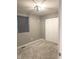 Bedroom with neutral carpet, closet, and a window for natural light at 712 W Main St, Thorntown, IN 46071