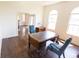 Spacious office features dark hardwood floors, bright arched windows, and an executive desk at 7493 W Lane Rd, McCordsville, IN 46055