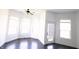 Bright sun room features ample windows and a door leading outside at 7493 W Lane Rd, McCordsville, IN 46055