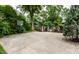 Outdoor basketball court with a well-maintained surface and surrounding greenery at 7743 Camelback Dr, Indianapolis, IN 46250