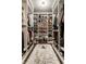 Spacious walk-in closet with custom shelving and ample storage space at 7743 Camelback Dr, Indianapolis, IN 46250